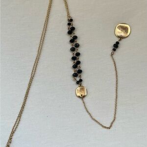 Elegant Gold and Black Necklace